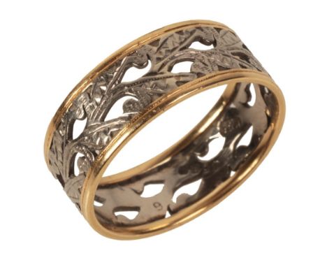 AN 18CT WHITE AND YELLOW GOLD WEDDING RINGwith pierced floral decoration, ring size Q (c.4.19g gross weight)