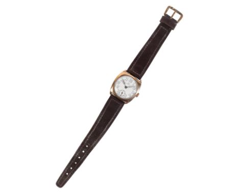 OMEGA: A GENTLEMAN'S 9CT GOLD WRISTWATCHwith manual wind movement, the white enamel dial with subsidiary seconds dial, black 