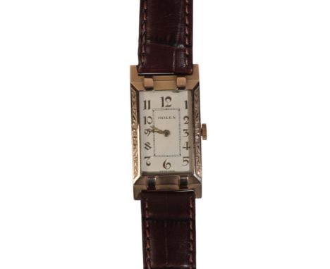ROLEX: A GENTLEMAN'S 14CT GOLD WRISTWATCHwith manual wind movement, the white dial with gold Arabic numerals and gold hands, 
