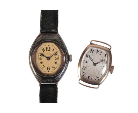VERTEX: A LADY'S 9CT GOLD WRISTWATCHwith manual wind movement, the silver "sunburst" dial with black Arabic numerals and dark