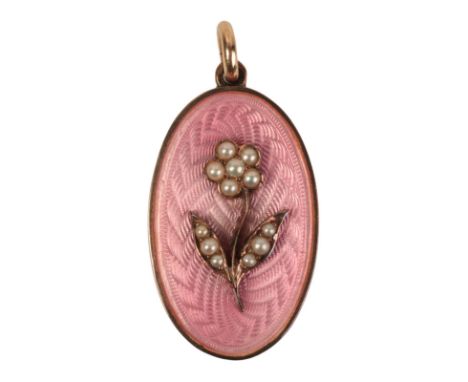 A PINK GUILLOCHE ENAMEL AND PEARL SET LOCKETthe twelve seed pearls forming the shape of a flower, with a glass locket back in