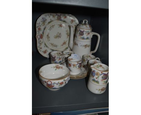 A part coffee service by Royal Worcester Pekin Butterfly Branch design only one saucer being damaged all other pieces good