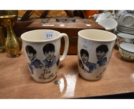 Two vintage 1960s Beatles mugs marked underside, Broadhurst Bros Burlsem.AF
Chips and hairline to both