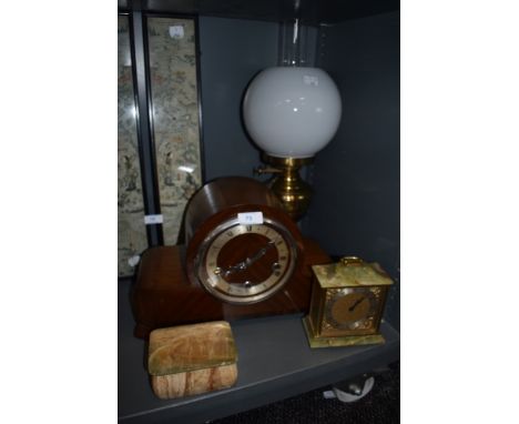 A brass bodied oil burning lamp and an art deco styled mantle clock, also agate box and Weiss clock