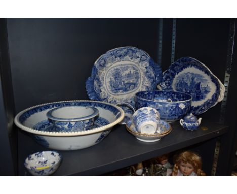 A nice selection of blue and white wear ceramics including Wedgwood hard paste tea cups and saucers and charger by R Hall