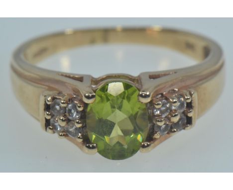 9ct gold, peridot & white stone ring, size Q, 3.6 grams 