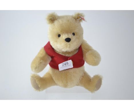 Steiff Collectors wind up musical Winnie the Pooh, with ear tag &amp; label, length 20.5cm