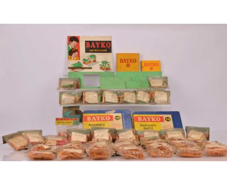 Collection of Bayko parts in original packaging, including 11C Accessory Outfit (2), 42 card headed bags 'Extra Parts', inclu