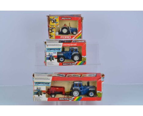 Britains Ford Tractors,  three examples, 9516 Ford Tractor and Yard Scraper (some discolouration), 9321 Power Farm Ford TW35 