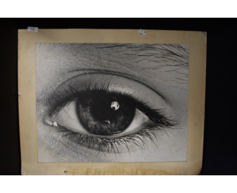 A mid century large photographic print of a female eye