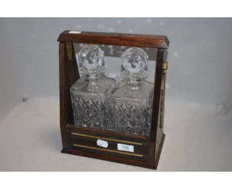 A vintage two decanter tantalus