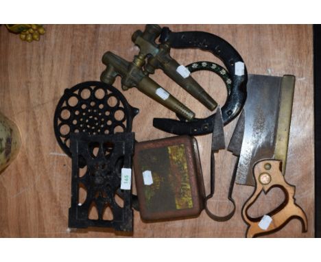 A selection of vintage tools and other items including small pair of shears, horse shoes, trivet and primus stove etc