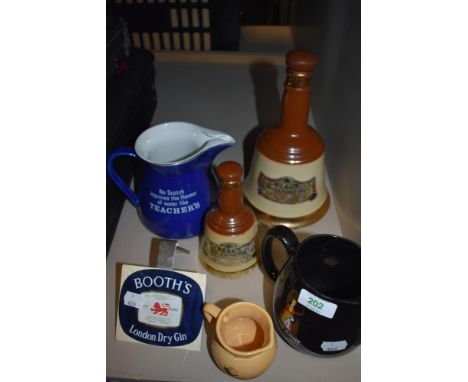A selection of Breweriana including Teachers water jug and Queen Anne scotch whisky water jug.