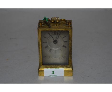 A 18th century Georgian carriage clock French made bearing name Y Rovas A Paris in ormolu case with chase work design
winding