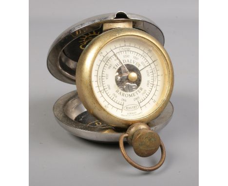 A Dalvey pocket barometer. H:8cm W:8cm.  