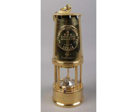 An Eccles Type 6 brass miners lamp The Protector Lamp &amp; Lighting Co. Marked for RAF Finningley. Presented by NCB Sports &