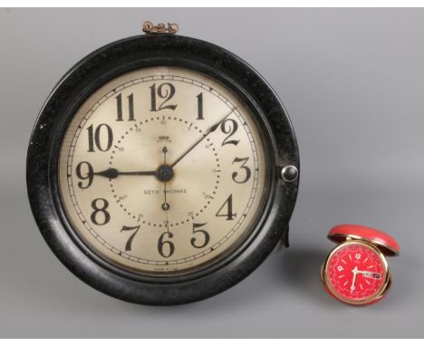 A Seth Thomas Wall clock with an Elgin cased alarm clock.  Wall Clock will need attention as not working.