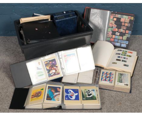 A large quantity of stamp albums, Royal Mail stamp cards, &amp; first day covers. To include a Penny Black stamp &amp; a ten 
