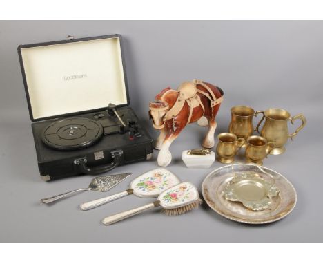 An assortment of miscellaneous. To include a Goodman's Portable record player, a large ceramic shire horse and brass tankards