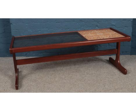 A retro teak framed tile and glass top coffee table. (45cm height, 121cm width 50.5cm depth)  