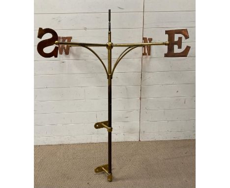 A brass weather vane with cooper compass points  (H127cm Dia105cm)
