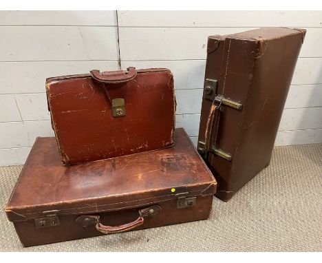 Three pieces of vintage luggage including leather briefcase 