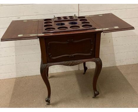 A mahogany drinks caddy and table on castors (H86cm W59cm D56cm)