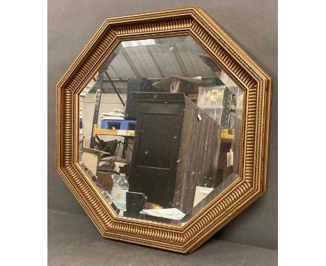 An octagonal gilt frame mirror 