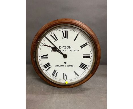A mahogany wall clock by Dyson 