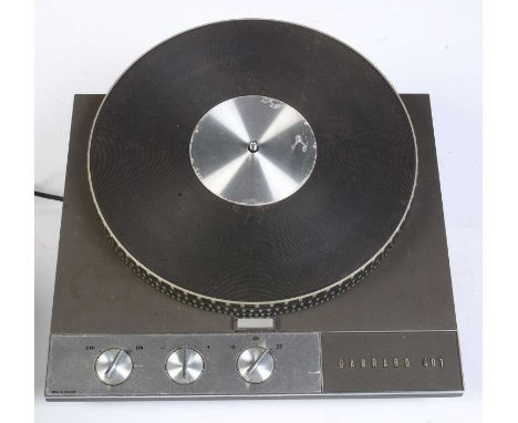 A vintage Garrard 401 turntable, serial number 25969, grey and chrome finish, in original box.