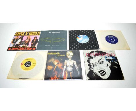 Seven 7" singles: Nirvana 'Lithium'; The Damned 'Cloise'; Rolling Stones 'Brown Sugar'; Guns n Roses 'Sweet Child o' Mine'; Y