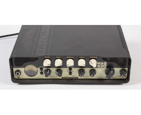 An Ashdown Rootmaster MAG 420 mini Bass amplifier head, with power cable.