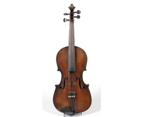 An early 20th Century Continental violin in Stradivarius style, with plain one-piece back, interior label dated 1733, length 