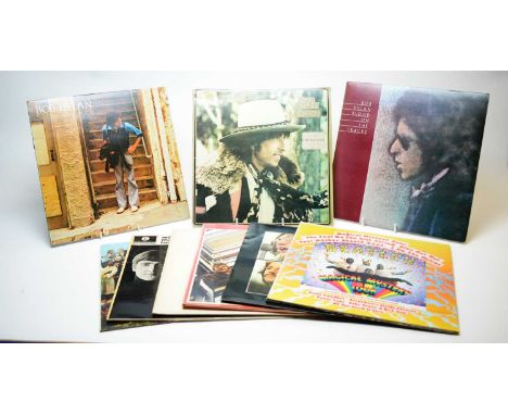 Six Beatles LPs, to include: Sgt. Peppers; With the Beatles; the White Album; Let it Be; Magical Mystery Tour; Anthology 1962