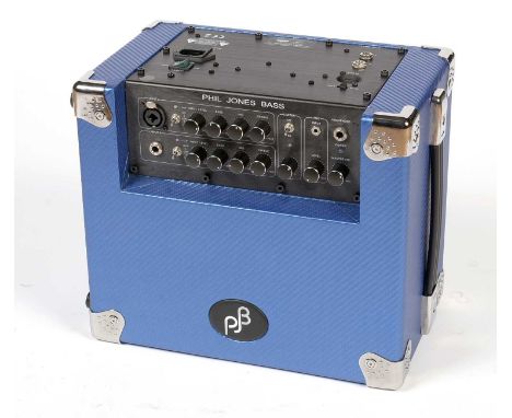 A Phil Jones Bass Cub BG-100 bass guitar amplifier in carbon blue colour, padded carry case.