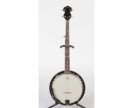 A Stagg five-string G banjo with aluminium tone ring, mahogany neck, rosewood fretboard, laminated mahogany resonator, Kinsma