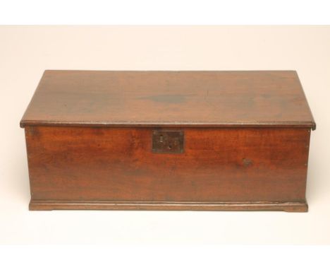 A GEORGIAN OAK BOARDED BOX/CHEST, 18th century, of oblong form with moulded edged hinged plank lid, moulded base and bracket 
