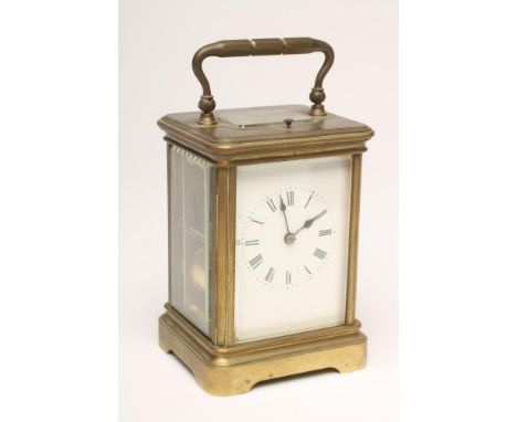A BRASS CASED CARRIAGE CLOCK, c.1900, the twin barrel movement with platform escapement and repeat mechanism striking on a go