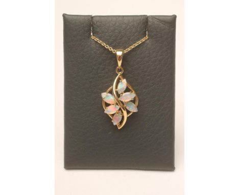 AN OPAL PENDANT, the open leaf shaped 9ct gold panel inset with six claw set opals on a plain bale and 9ct gold chain necklac