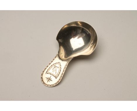 A GEORGE III SILVER CADDY SPOON, maker George Smith, London 1785 (incuse duty mark), with shield shaped deep bowl, the rounde