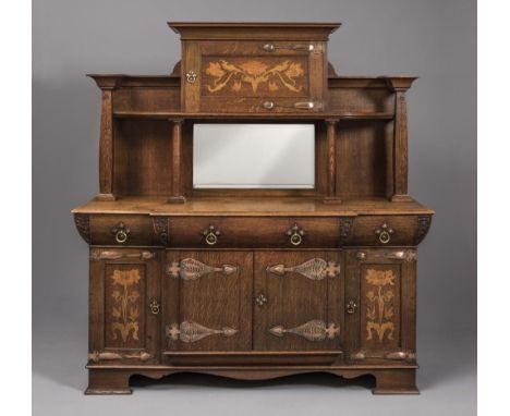 AN ARTS AND CRAFTS OAK AND MARQUETRY SIDEBOARD by Robson & Sons, Newcastle Upon Tyne, of breakfront form with floral marquetr