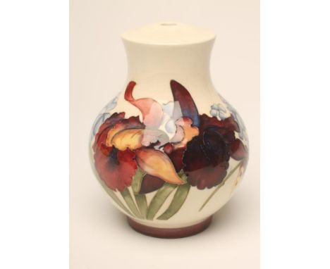 A MOORCROFT POTTERY LAMP BASE, c.1955, of baluster form, tubelined and painted in typical palette with the Orchid pattern on 