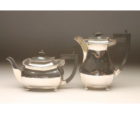 A SILVER TEA AND COFFEE POT, maker Blanckensee & Son Ltd., Birmingham 1923, of oblong baluster form with everted gadrooned ri