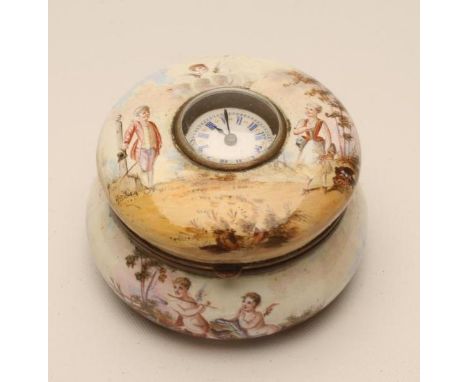 A CONTINENTAL ENAMEL DRESSING TABLE BOX AND COVER, c.1900, of cushion form, painted in coloured enamels with cupids in landsc