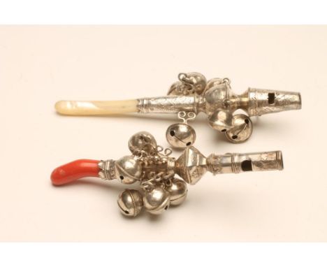 TWO GEORGIAN SILVER RATTLES/WHISTLES, indistinct marks, of baluster form, each hung with six bells, one with coral twig and o