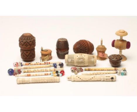 A COLLECTION OF SEWING ACCOUTREMENTS, late 18th century and later, including a boxwood drum measure with coffee grinder handl