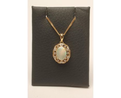 AN OPAL AND DIAMOND PENDANT, the claw set oval cabochon polished opal within an open border set with numerous small diamonds 