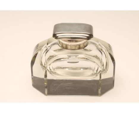 AN ART DECO SILVER MOUNTED HEAVY GLASS INKWELL/PAPERWEIGHT, maker Goldsmiths & Silversmiths Co. Ltd., Birmingham 1937, of can