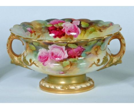 A ROYAL WORCESTER CHINA ROSE BOWL, 1912, of squat baluster form with everted scalloped rim and two naturalistic twig handles 
