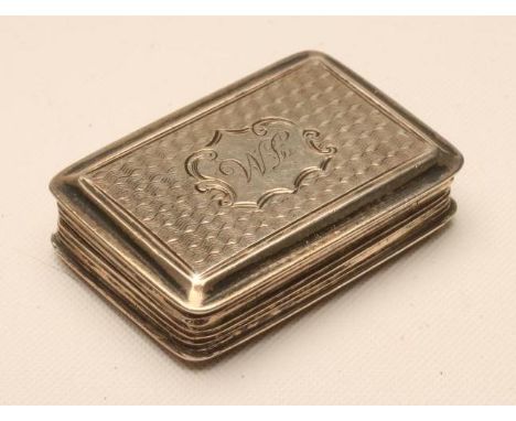 AN EARLY VICTORIAN SILVER VINAIGRETTE, maker Nathaniel Mills, Birmingham 1842, of plain oblong form with engine turning enclo